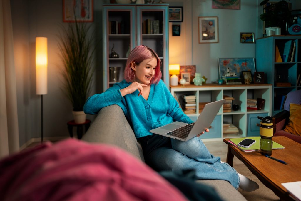 Happy girl on a laptop