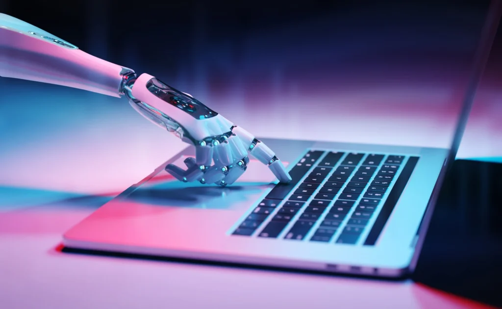 Robotic hand writing on a laptop - Freelance AI Jobs
